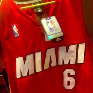 Well kept Miami Heat Jerseys with all tags, of LeBron James Size 44